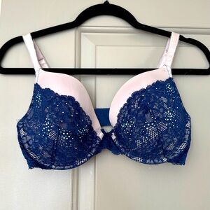 Victoria’s Secret cream/navy lace bra with rhinestones